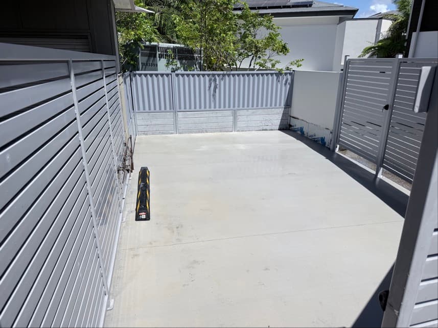 Completed enclosure interior showing concrete slab