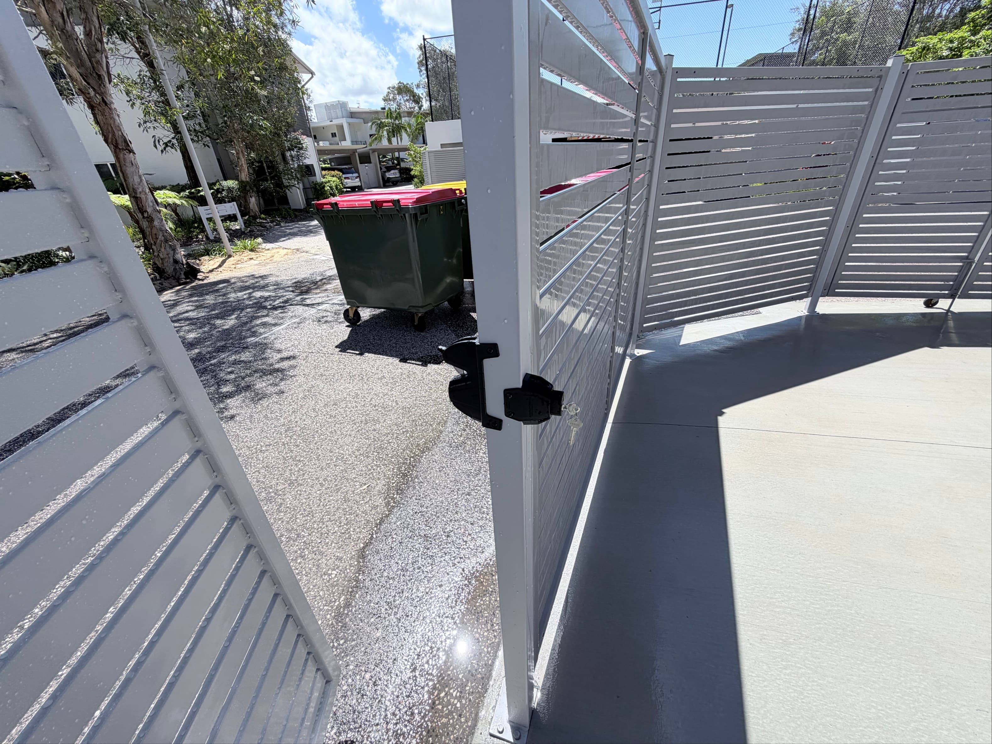 Gate hardware detail on completed aluminium gate