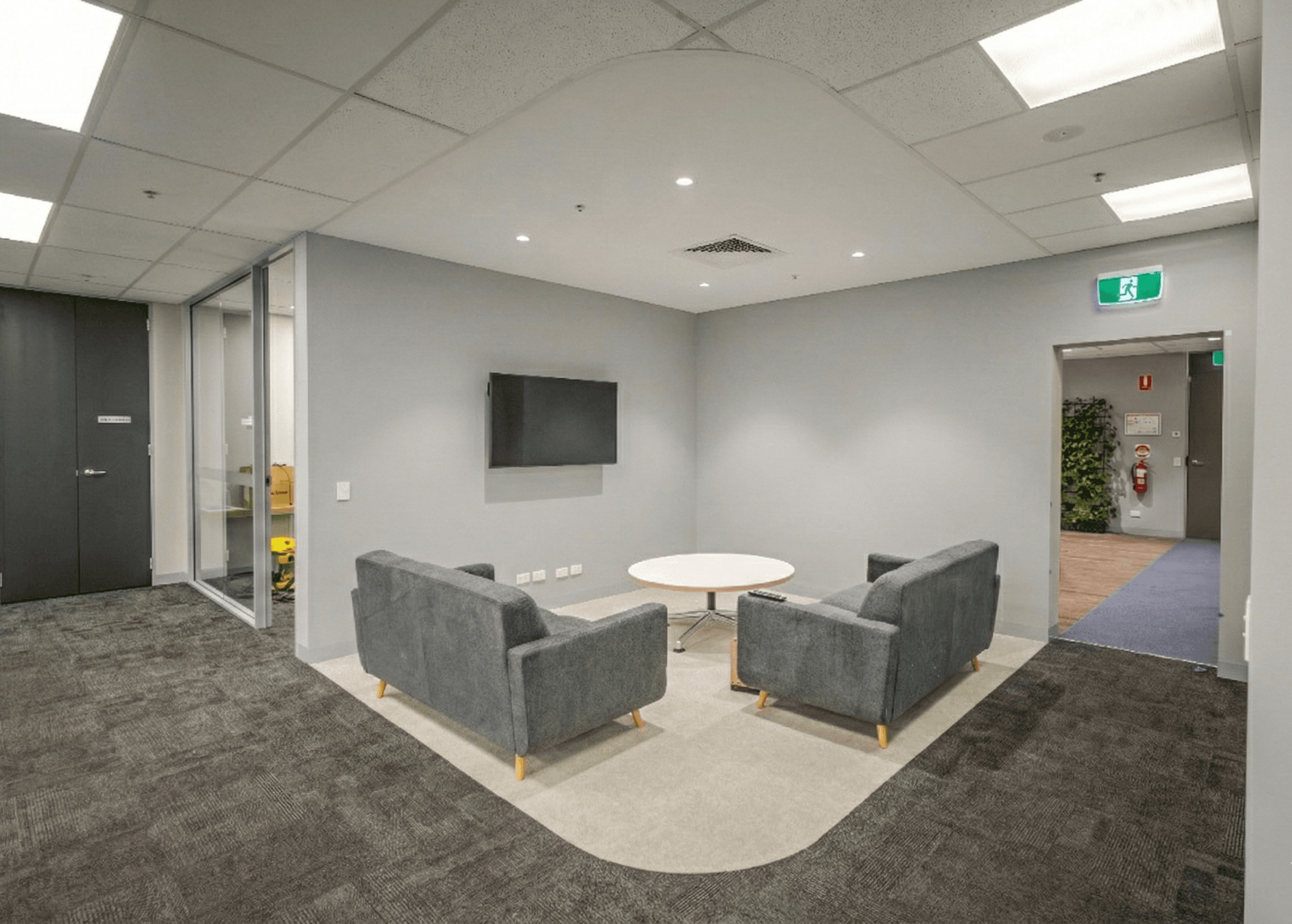 Informal lounge with sofas and screen